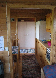 Ferienhaus   007 Blick vom Wohnbereich in Richtung K�che und Vorraum